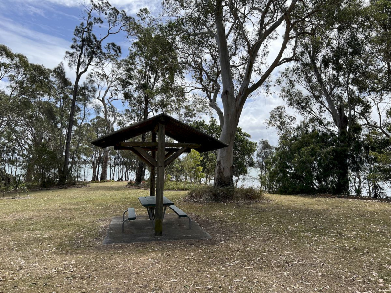 Sunset-Park-picnic-table-with-cover-near-entrance-eastern-view