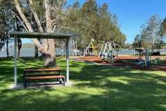 Tanilba-Park-picnic-shelter-with-table-seating